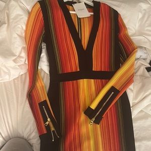Balmain beautiful dress with golden zippers.